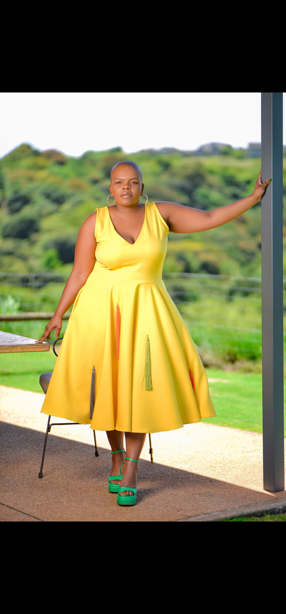 Yellow dress with tassle details